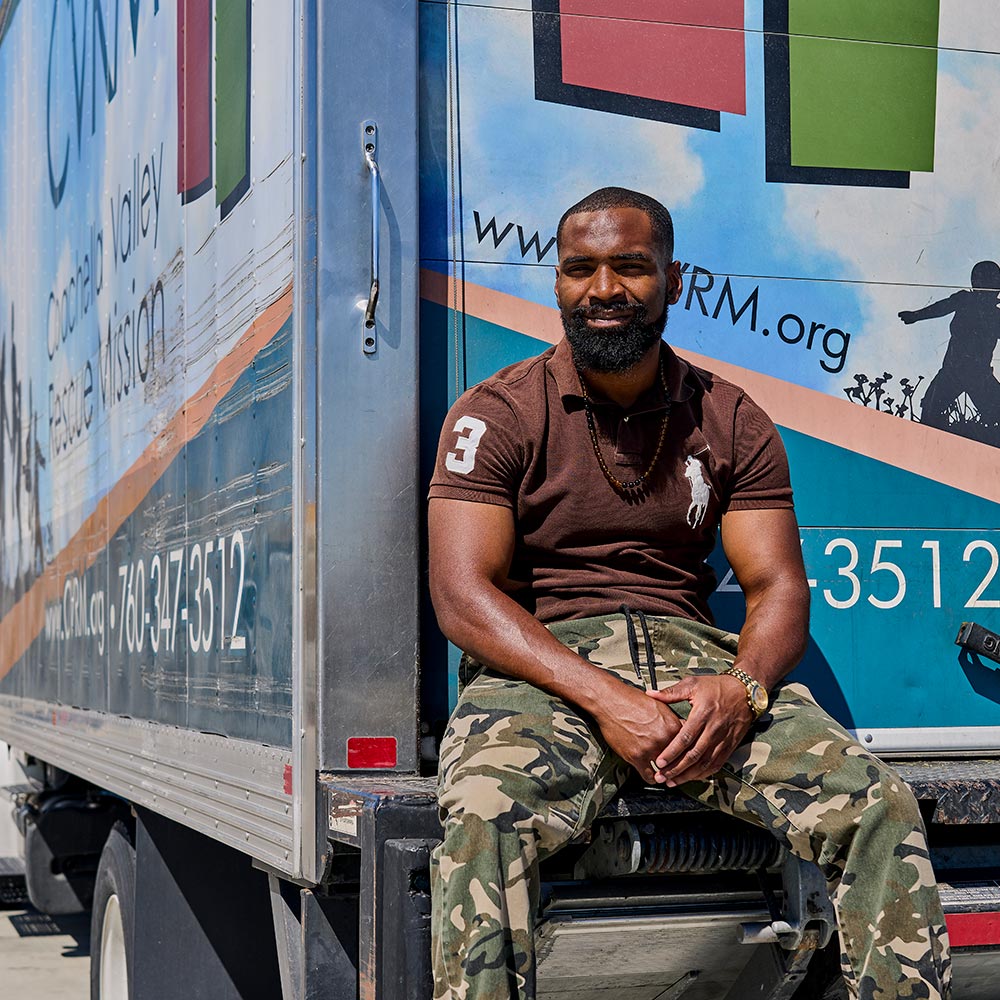 Volunteer helping move items at CVRM's New Life Resale Boutique