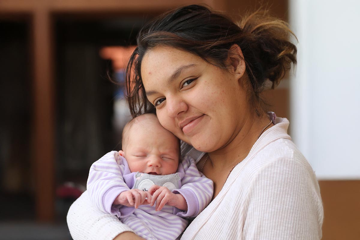 Mother and child who have received help from CVRM