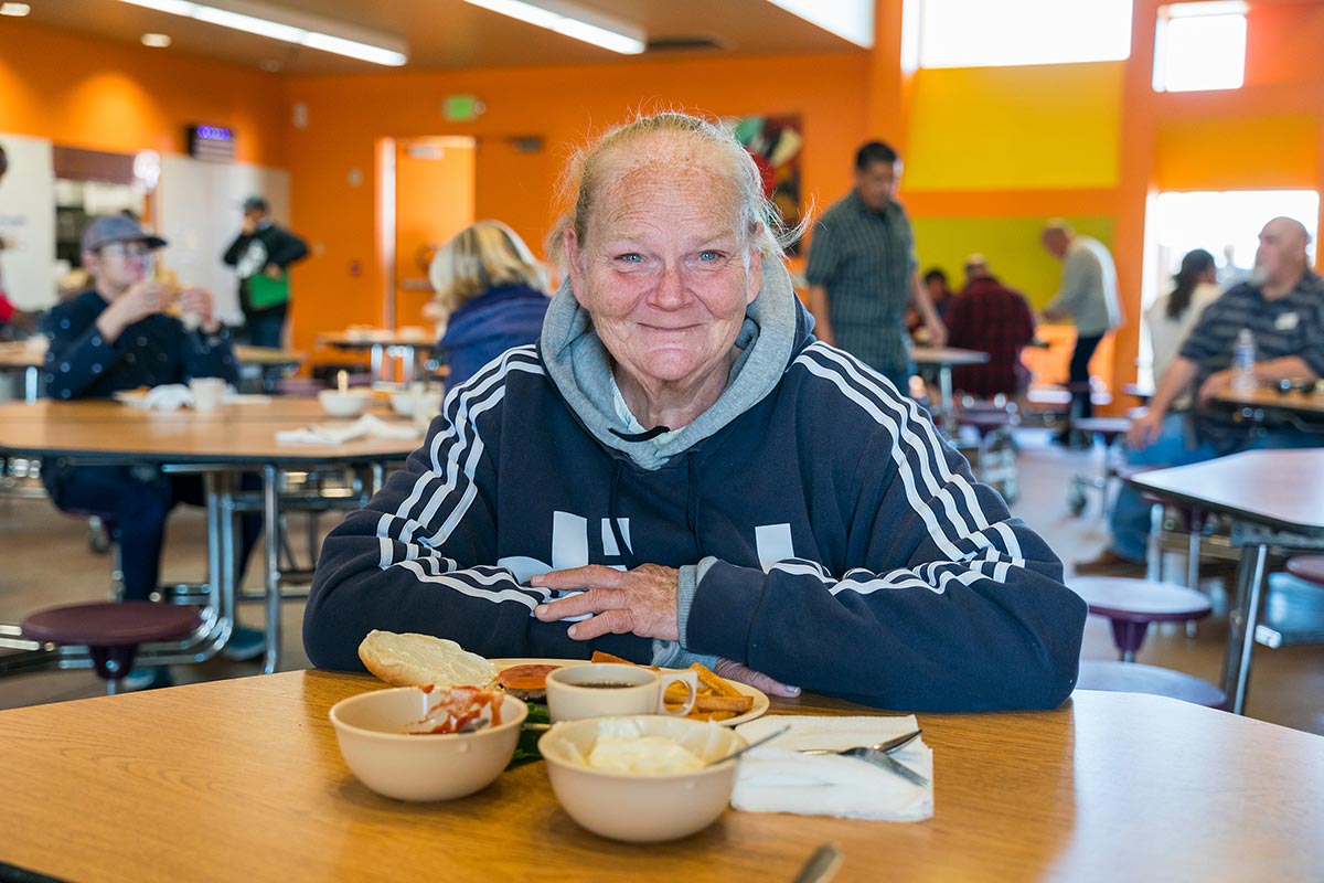 Person receiving a hot meal at CVRM