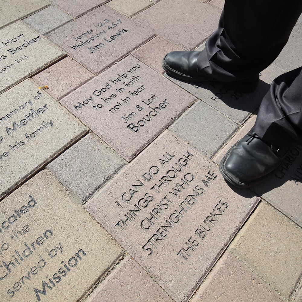 Sidewalk bricks at CVRM with dedications